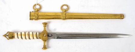 An Imperial German Naval Dirk: the straight double edged and double fullered blade with traces of