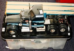 A collection of built and part built models of cars and other vehicles: including a Porsche 935 in