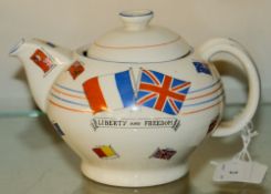 A WWII Ducal 'War Against Hitlerisim' Souvenir teapot: decorated with Flags of Allied Nations and