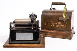 An Edison Type 1 'Gem' phonograph: with pressed aluminium horn over black lacquer and gilt body,