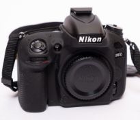A Nikon D610 Digital camera, full frame, serial number 2036419,: including silicone body cover,