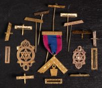 A collection of 9ct gold masonic jewel bars and pins etc: including two fobs, 55g.