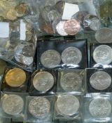 An 1897 higher grade shilling together with other mixed coins: