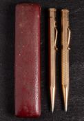A 9ct gold Yard-O -Led propelling pencil: with milled body and engraved 'D Pink' together with a