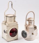 A BR signal lamp with red lens and one other lamp: (2)