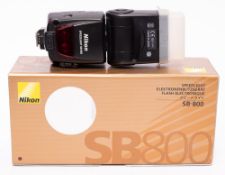 A Nikon SB800 Speedlight in original box.