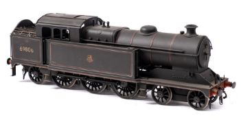 A kit built O gauge model of a BR Class A5/1 4-6-2T locomotive No 69808: black in an associated box.