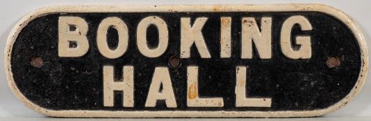 A cast iron doorplate 'Booking Hall': 12 x 37cm.