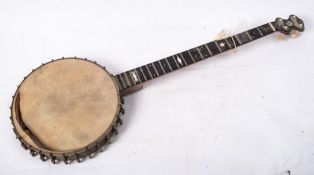 An early 20th century five string banjo by J Winder, London,