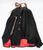 A Royal Marines black cape: together with a Volunteer Engineers black cape,