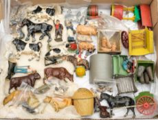 A collection of Britains farm animals and figures: including Farmer and his wife, a Blacksmith,