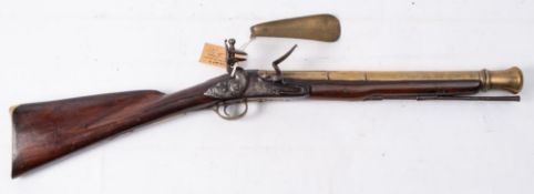 A late 18th century brass barrelled flintlock blunderbuss: 16 1/4 inch three stage barrel with
