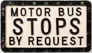 A cast aluminum double sided road sign 'Motor Bus Stops By Request': with some original 'fruit