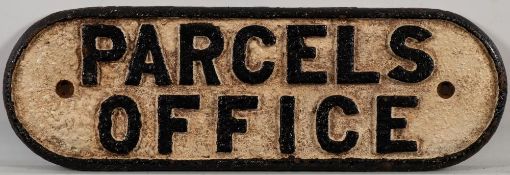 A cast iron doorplate 'Parcels Office': 12 x 37cm.