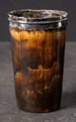 A Georgian silver mounted horn beaker: of plain form circa 1810, 11cm high.