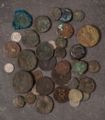 A mixed group of coins including Roman: and a Faience 'Eye of Horus' charm.