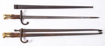 A pair of fire tongs construed from a WWI Gras bayonet,