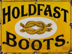 An enamel sign 'Holdfast Boots': black text on yellow ground around a oval cartouche with reef knot