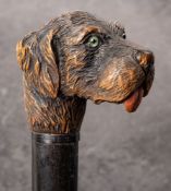 A late 19th/early 20th century Continental carved dog's head walking cane: possibly Bavarian,