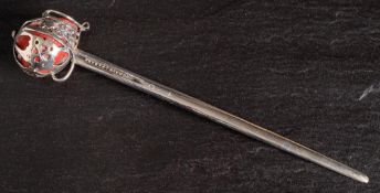 A silver letter opener in the form of a Scottish Broadsword, maker J W Kirwan & Co,
