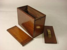 A late 19th century mahogany stereoscope slide box: with brass sprung retaining cover under sliding