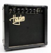 A Hayden HGTP 15 Tube Preamplifier: with Celeston 'Super 8' speaker in a black case.