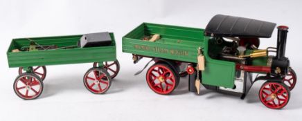 A Mamod Steam Wagon: green and black fitted gas conversion firing unit, together with a Mamod OW.