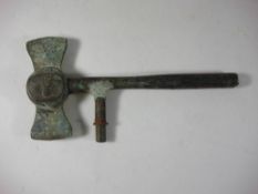A tail section of a bronze ship's weather vane,