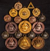 A collection of gilt circular Masonic emblems: various lodges and makers including Toye,