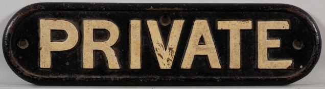 A cast iron doorplate 'Private': 9x34.