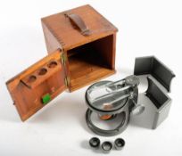 A 20th century dissecting microscope by C Baker, London:,