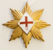 A gilt and enamel Masonic jewel: in the form of an eight pointed star with St.