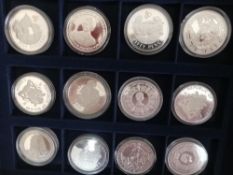 Collection of mostly silver coins, including proof crowns, Victorian crown, world coins,