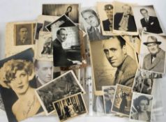 A collection of signed photographs of actors and entertainers: Alastair Sim, Harry Secombe (x2),