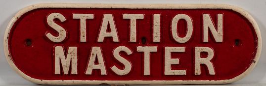 A cast iron doorplate 'Station Master': 12 x 37cm.