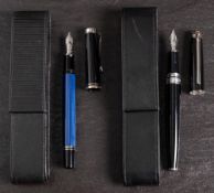 A Pelikan M400 Souveran fountain pen in blue: in a black leather case,