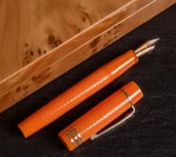 An Onoto Magna Classic Tangerine and Stirling silver limited edition fountain pen: No.