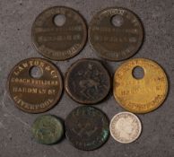 An accumulation of miscellaneous coins: including four numbered tags for 'Launton & Co