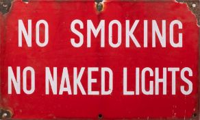 A red enamel warning sign 'No Smoking.