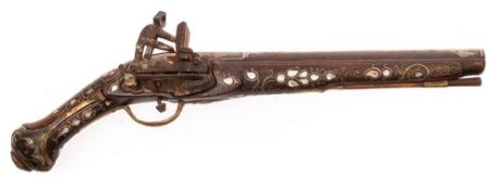 A 19th century Turkish white metal and mother of pearl inlaid flintlock pistol,