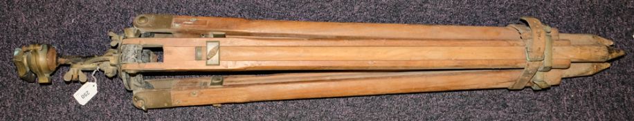 A teak and brass mounted tripod: unsigned, with ball joint mount,.