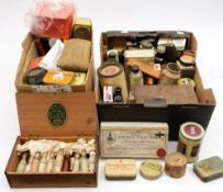 A collection of early to mid 20th century pharmaceutical tins and bottles: (two boxes)