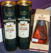 Two bottles of Famous Grouse 1987 Vintage Malt Whisky and a bottle of Bell's Extra Special