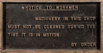 A wooden workshop sign 'Notice To Workmen.