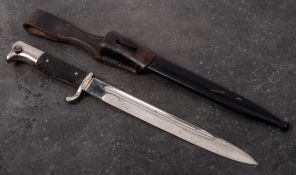A Third Reich period K98 dress bayonet and scabbard by Puma: straight single edge fullered blade