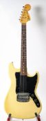 A 1970 Fender 'Bronco' electric guitar: maple neck with rosewood fingerboard and dot fret markers,
