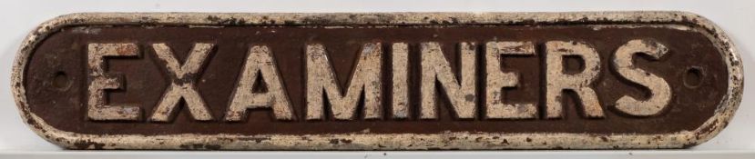 A cast iron doorplate 'Examiners': 9 x 48cm.