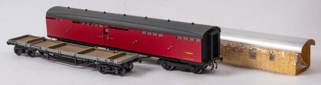A Skytrax O gauge flat wagon: together with a built kit cattle wagon and a Model Express kit for a