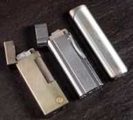 A Vintage Dunhill rollergas lighter: with silver plated milled body,