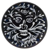 Wedgwood for the National Art Collections Fund: a black basalt plate enamelled in white with green